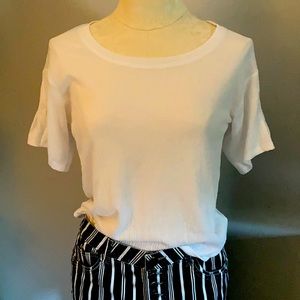 Short white flutter sleeve top.